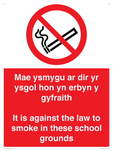 Mae ysmygu ar dir yr ysgol hon yn erbyn y gyfraith It is against the law to smoke in these school grounds - Bilingual Welsh / English